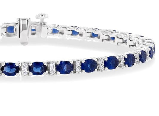 Oval sapphire and diamond station bracelet.