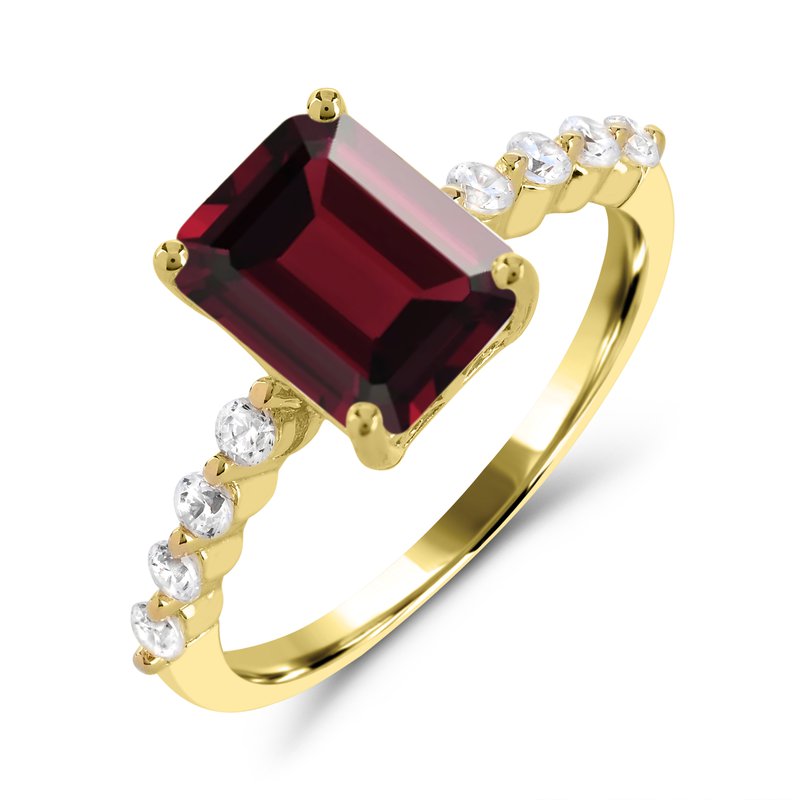 Emerald garnet ring with diamonds in gold.