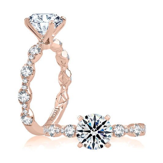 Rose gold ring with round diamonds.