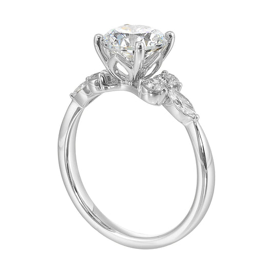 Yellow gold ring with various diamond shapes.