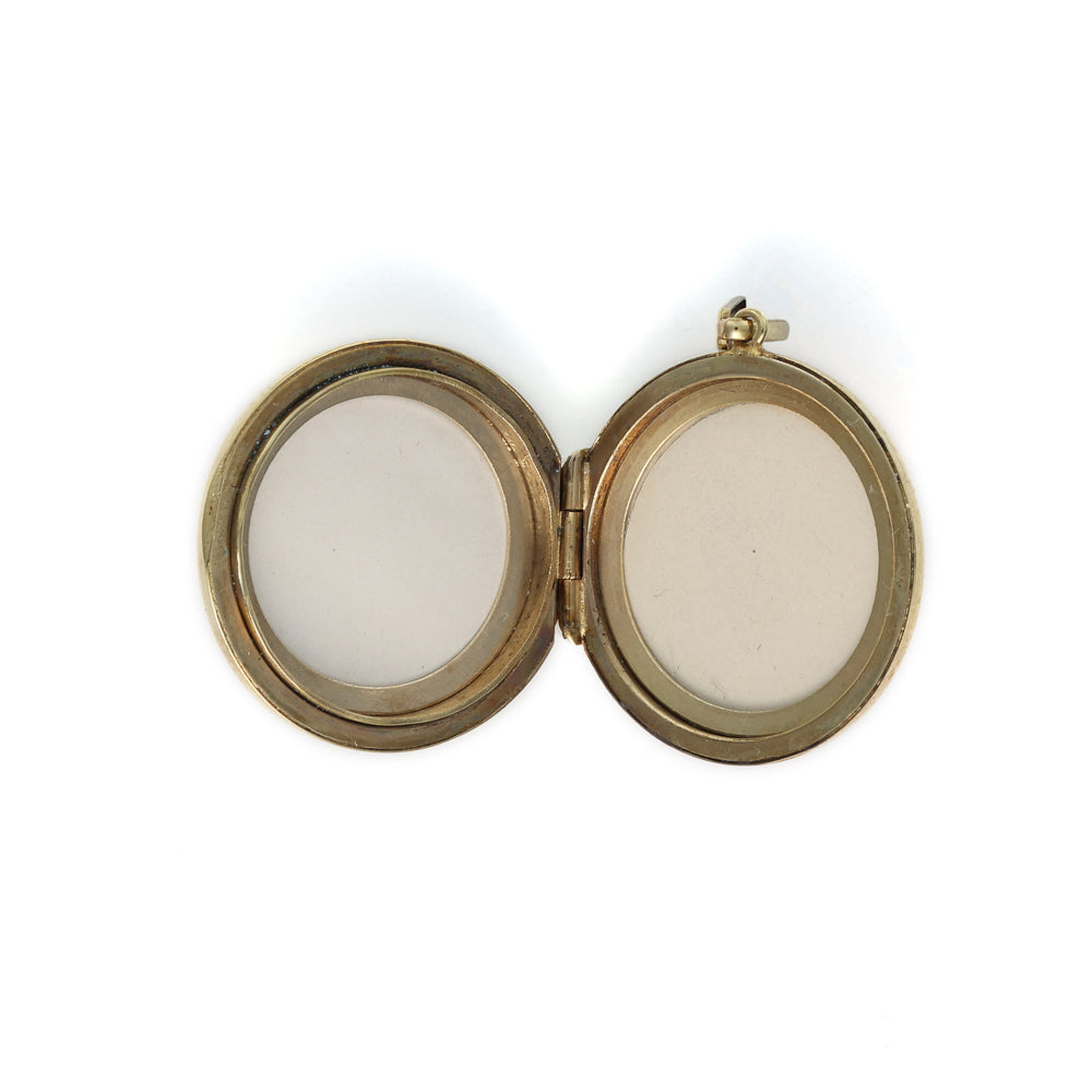 Open oval locket, 9K yellow gold.