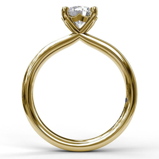 Solitaire diamond ring, 14K yellow gold.