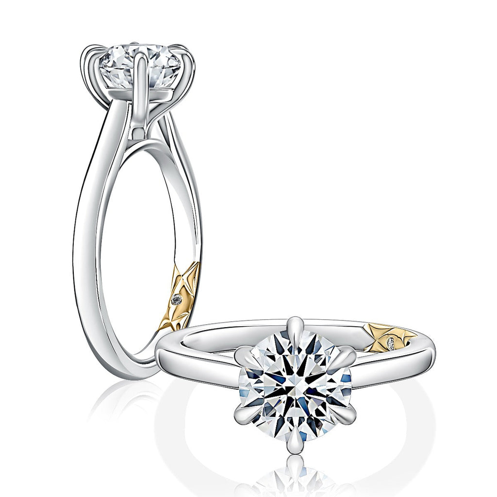 14K white gold ring with round diamond.