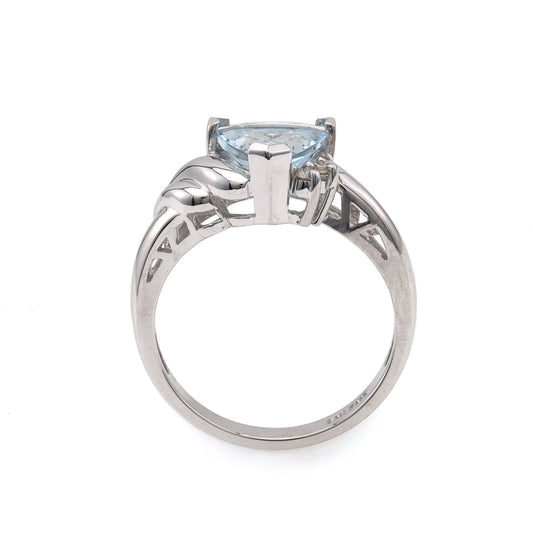 Triangular aquamarine ring in white gold.