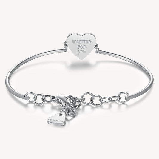 Stainless steel bangle with engraved heart charm.