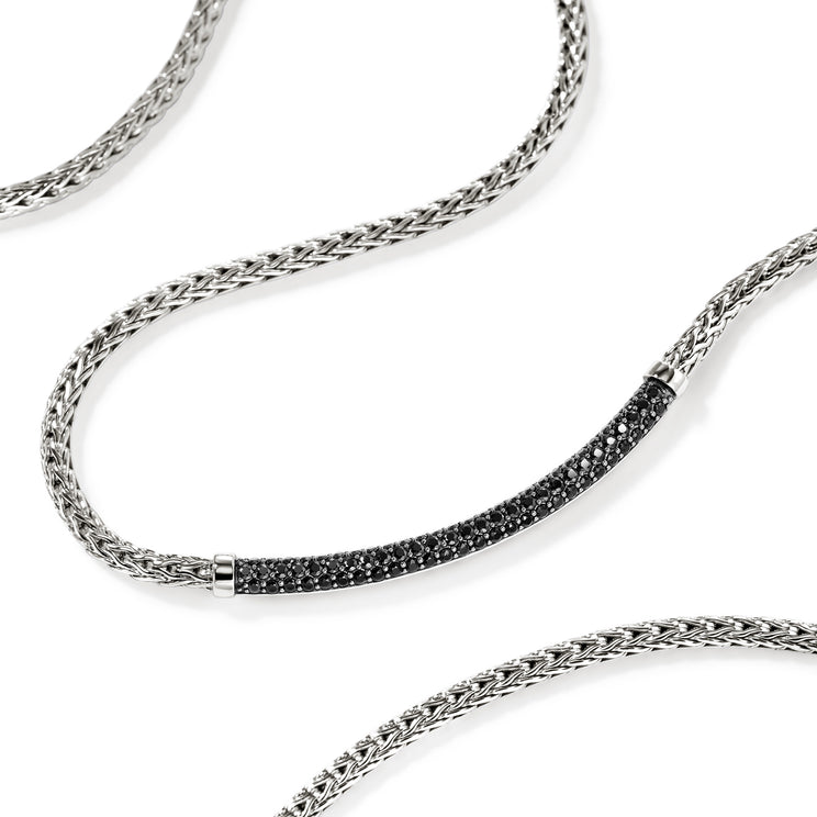 Sterling silver necklace with black sapphire bar.
