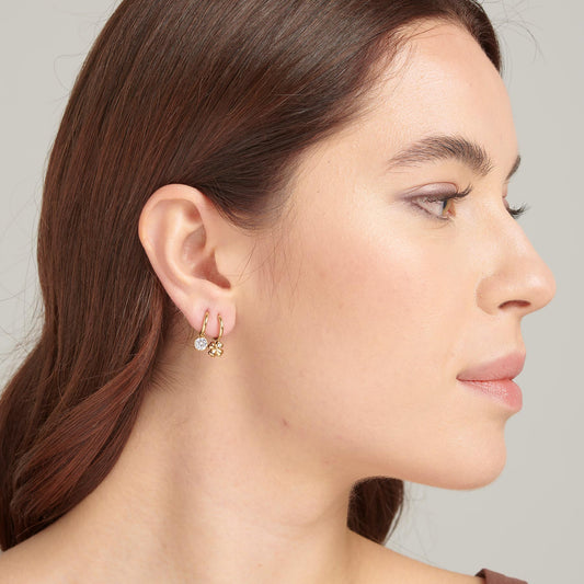Yellow stainless steel dangle earrings with stones.