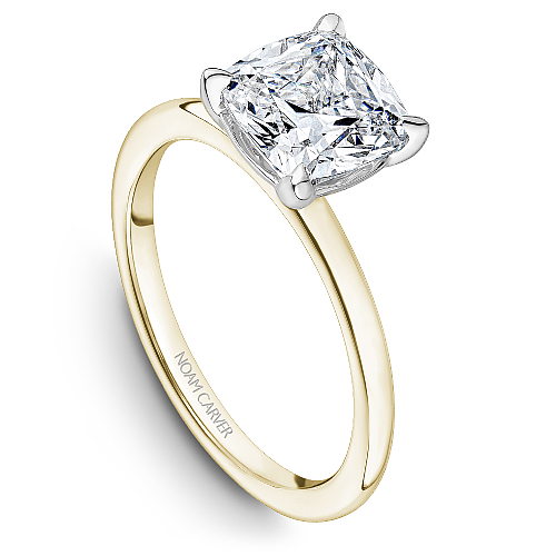 Solitaire diamond ring in yellow gold.