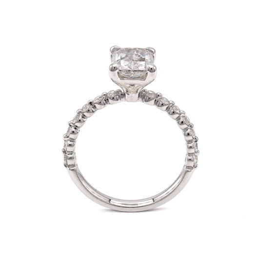 14K white gold ring with side diamonds.