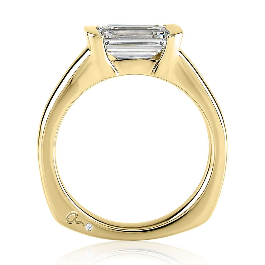 Yellow gold ring with solitaire diamond.