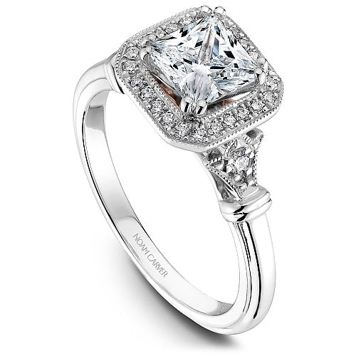 Halo vintage diamond ring, white gold setting.