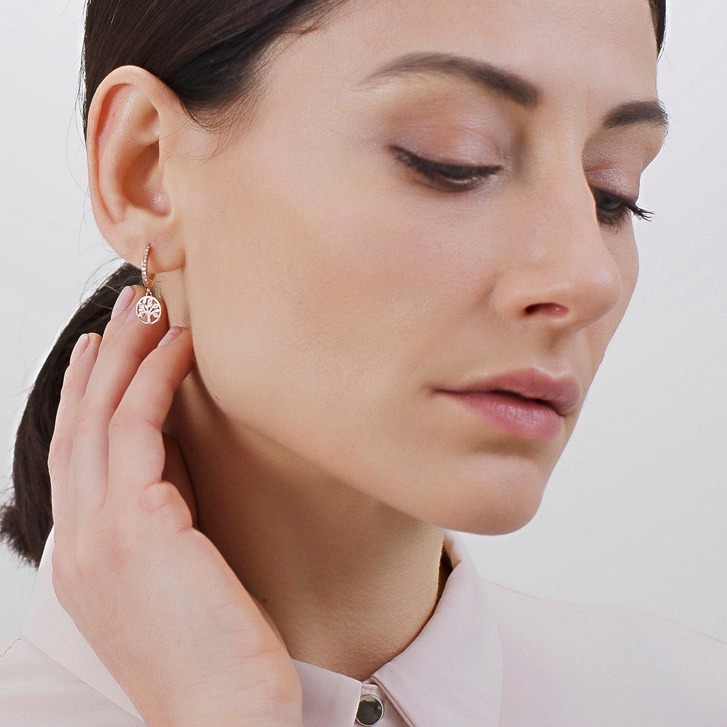 Gold-plated drop earrings with simulated diamonds.