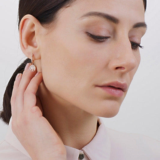 Gold-plated drop earrings with simulated diamonds.