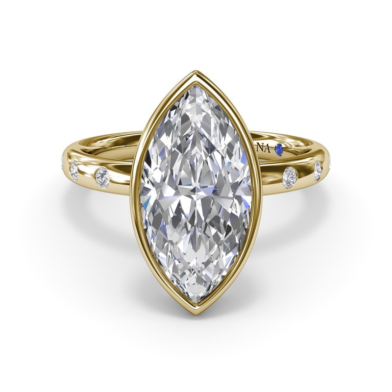 Marquise diamond ring with side stones.