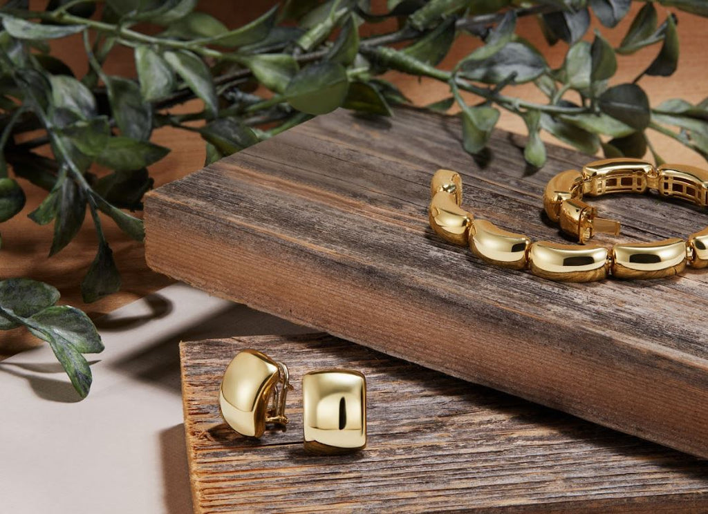 14K yellow gold huggie earrings, polished finish.