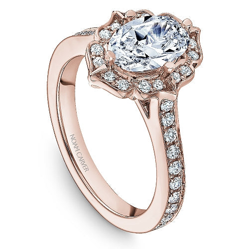 Rose gold halo diamond engagement ring.