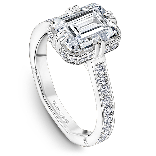 14K white gold ring with diamond halo.