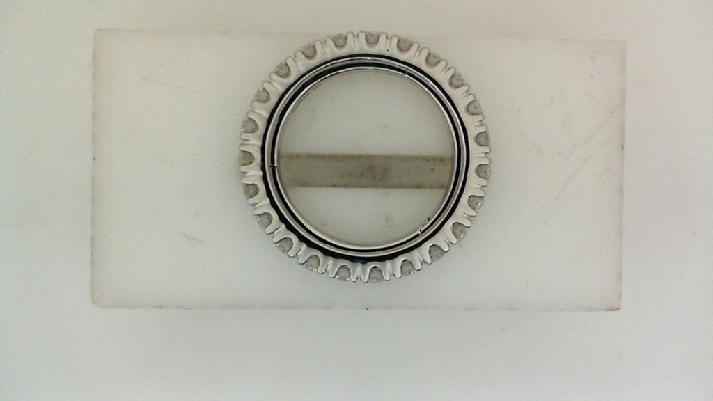 White gold ring with round diamond settings.