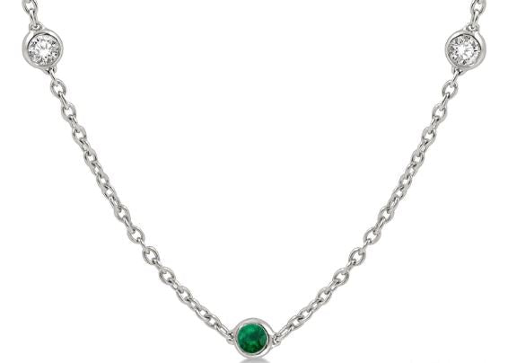 White gold necklace with sapphires and diamonds.