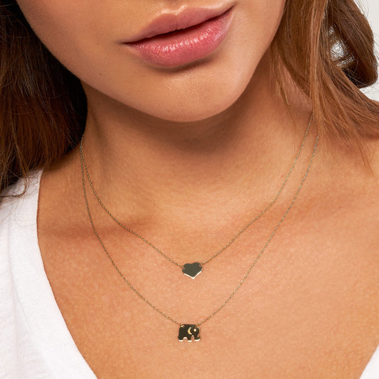 14K yellow gold heart necklace, Singapore chain.