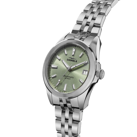 Green dial stainless steel automatic men's watch.