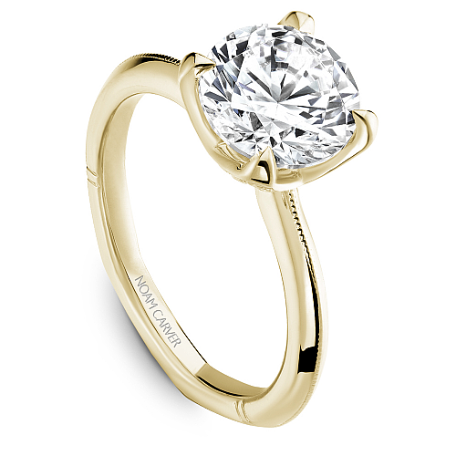 Yellow gold ring with round diamond accents.