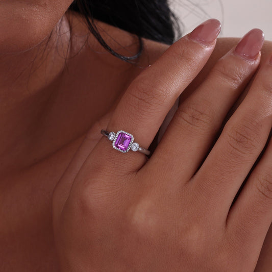 Emerald-cut pink tourmaline ring with diamonds.