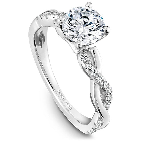 14K white gold diamond twist ring.