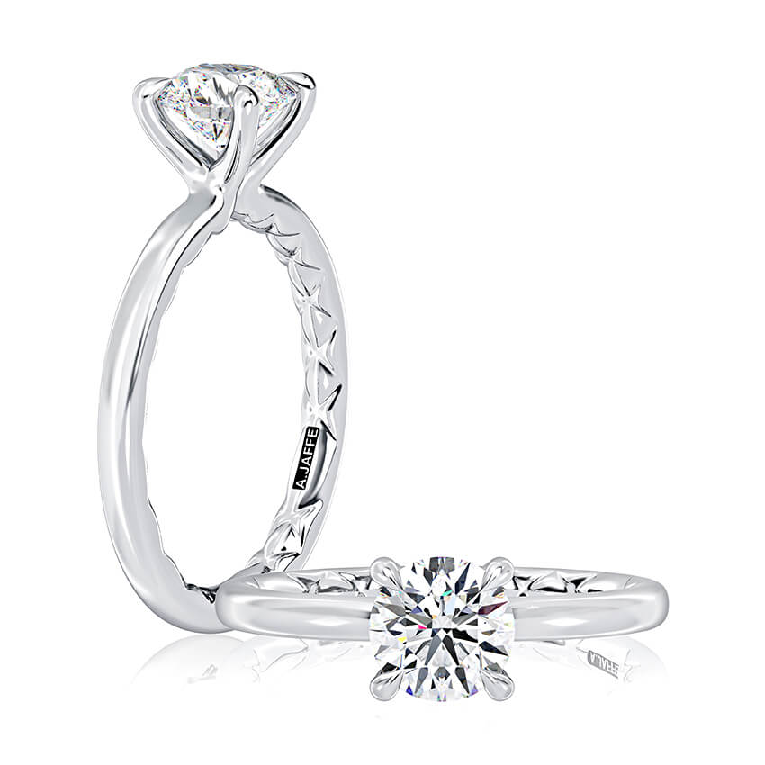 Solitaire diamond ring, yellow gold, intricate band.