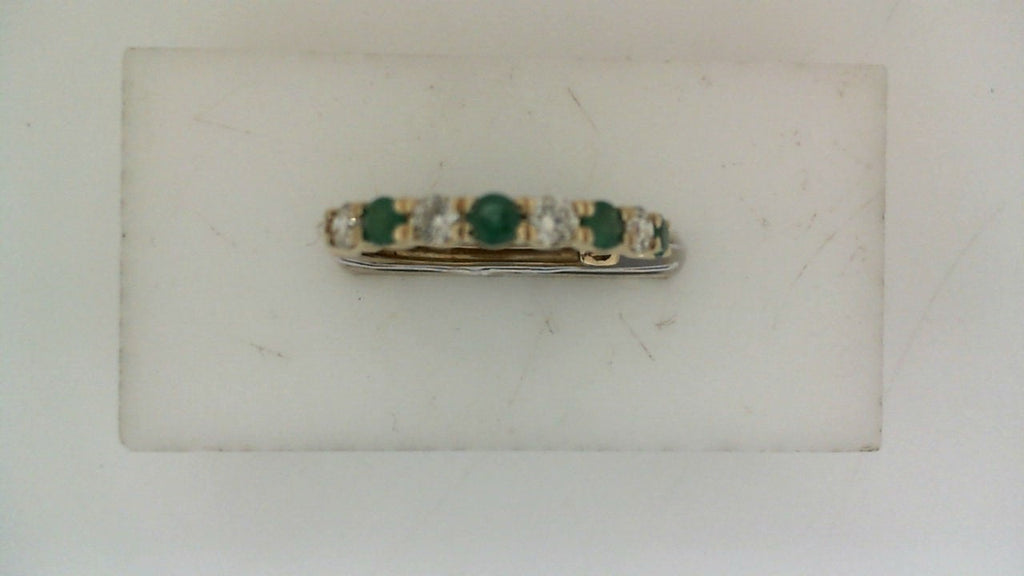 Emerald and diamond gold hoop earring.