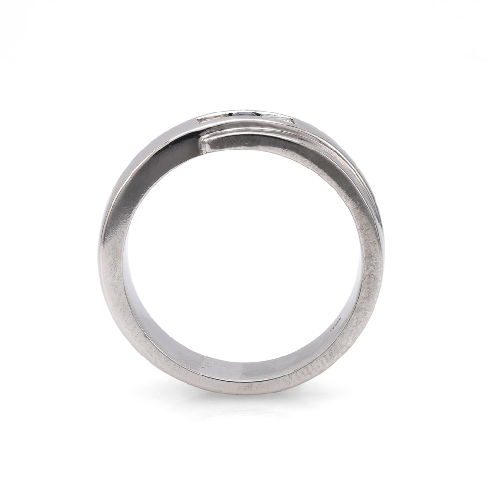 18K white gold band with sapphire, diamonds.