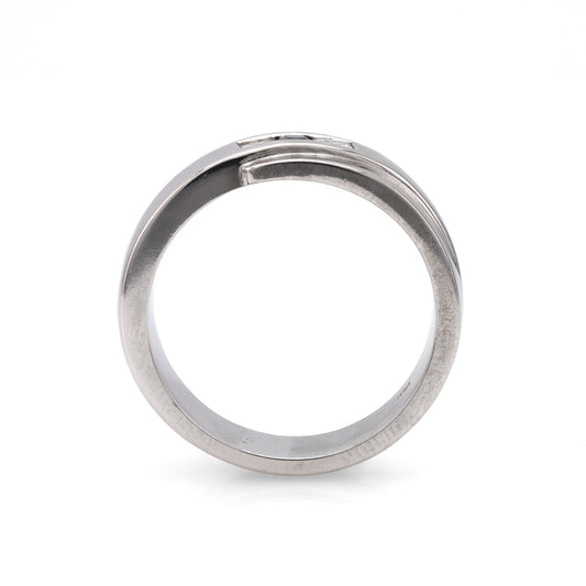 18K white gold band with sapphire, diamonds.