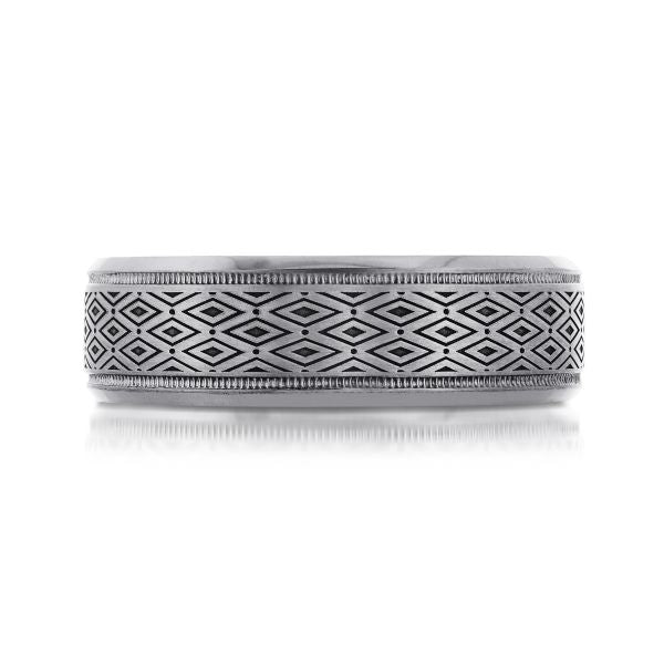 Tantalum band with geometric carved pattern.