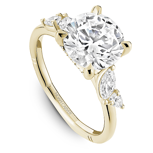 14K yellow gold ring with marquise diamonds.