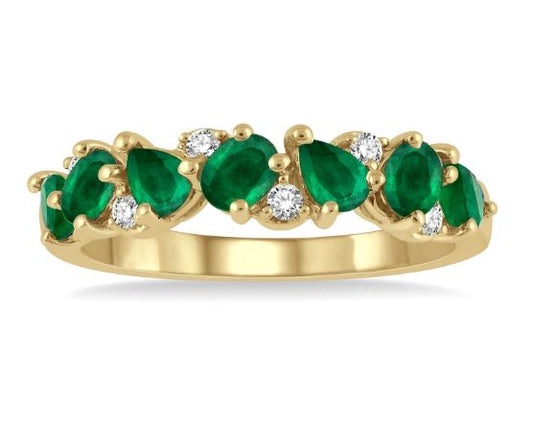 Emerald and diamond band in yellow gold.