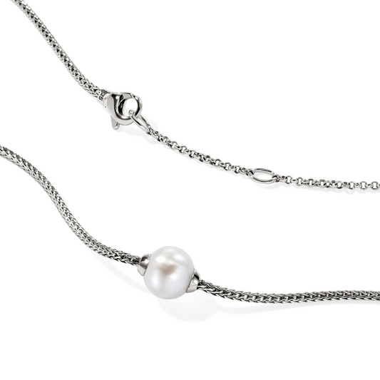 Sterling silver necklace with cultured pearl pendant.