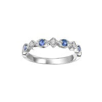 White gold band with sapphires and diamonds.