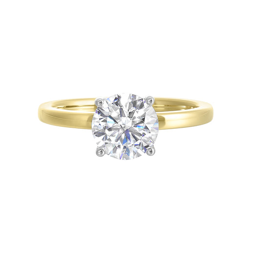 Solitaire diamond ring in yellow gold.
