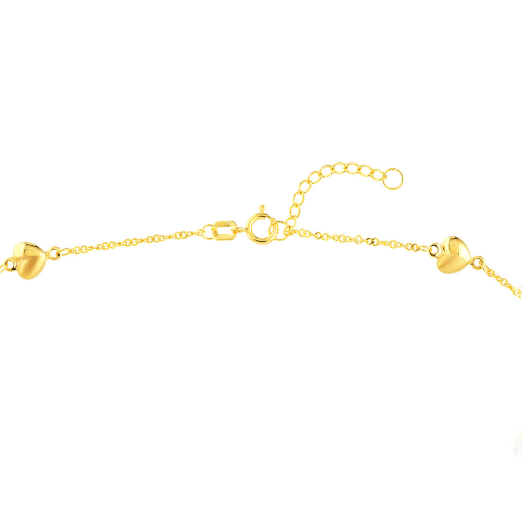 14K yellow gold ankle bracelet with hearts.