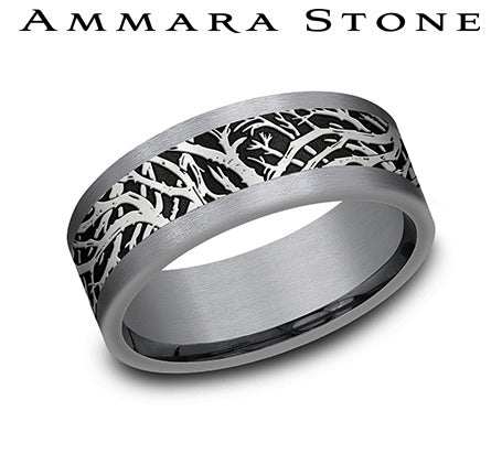 Carved tantalum band with intricate design.