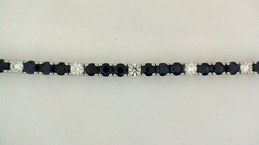Color Gemstone Bracelet in 14 Karat White with 30 Round Sapphires 9.41ctw