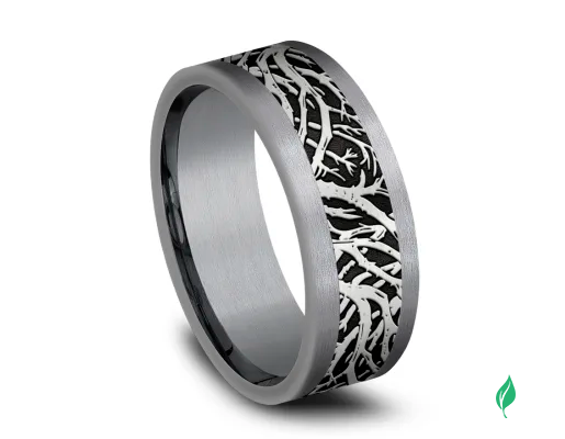 Carved tantalum band with intricate design.