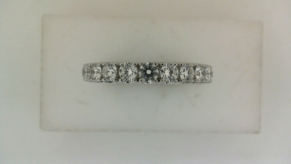 Yellow gold band with round diamonds.