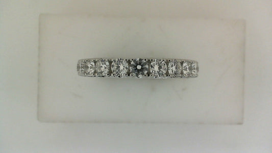 Yellow gold band with round diamonds.