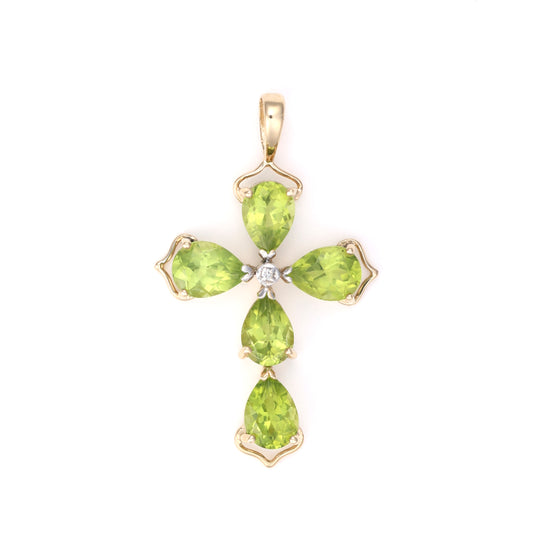 Peridot cross pendant with diamond center.