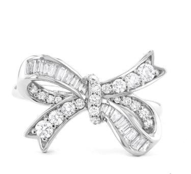 White gold ring with various diamond shapes.