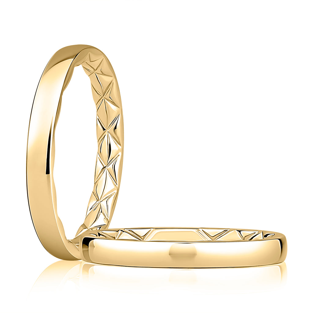 Carved 14K yellow gold band, polished finish.