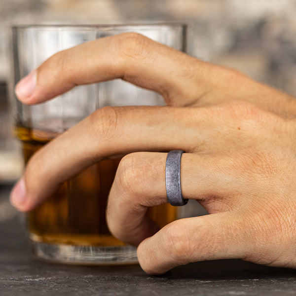 Satin grey tantalum carved band ring.