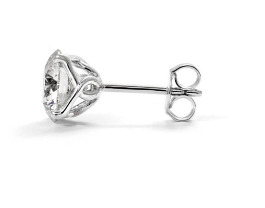 18K white gold stud with round diamond.