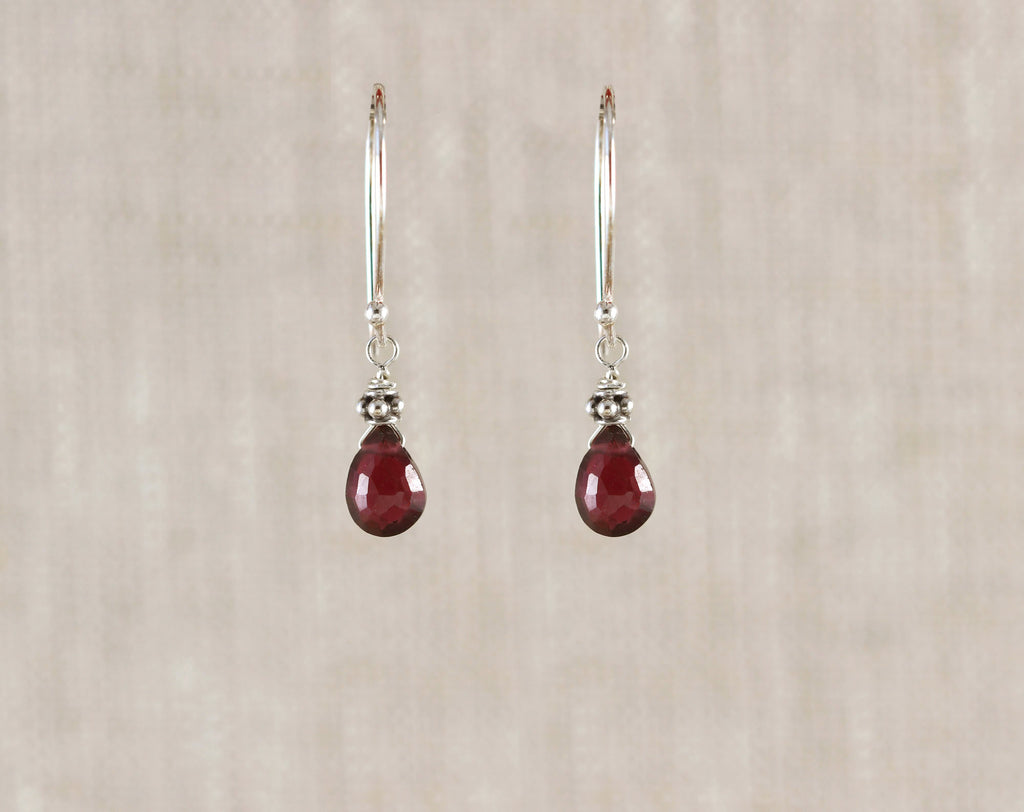 Tear drop rhodolite garnet silver earrings.